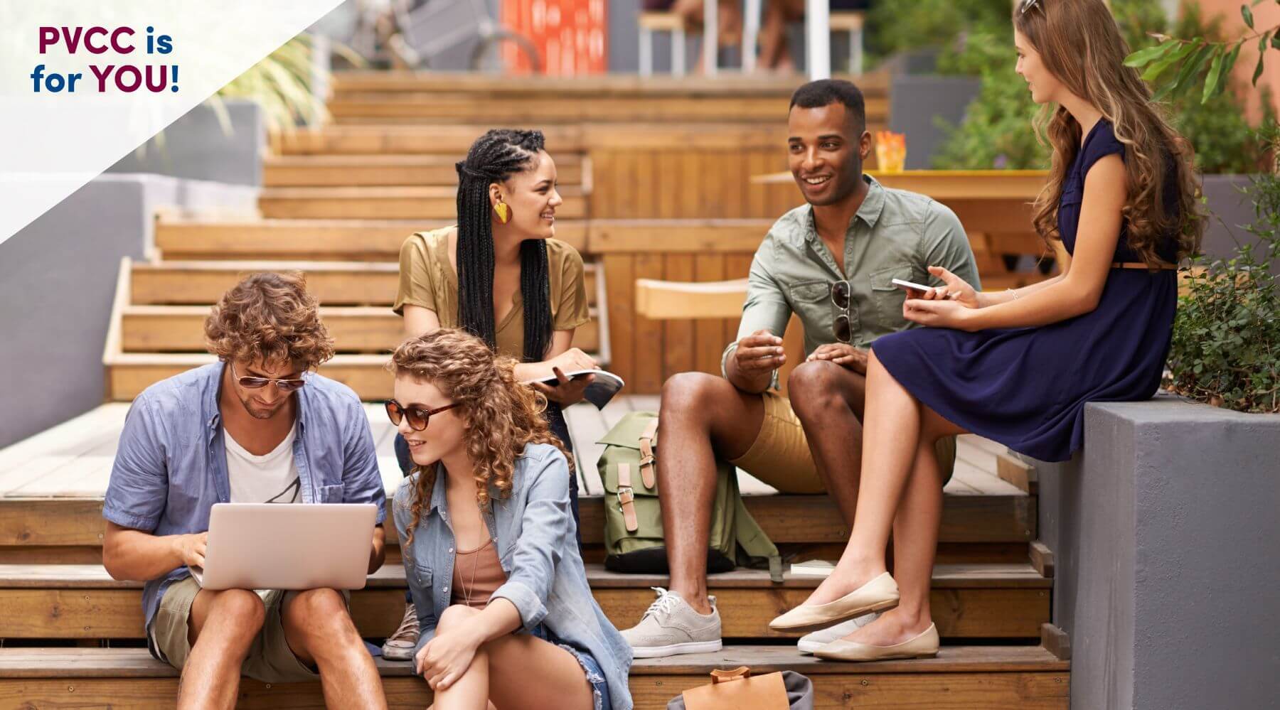 Group of diverse students studying.