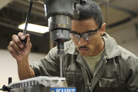 man using drilling equipment